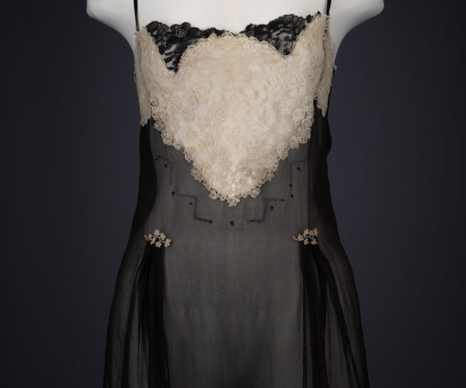 Black Silk Step In With Blonde Lace Appliqué By Chas A. Stevens & Bros, c. 1920s, USA. The Underpinnings Museum. Photography by Tigz Rice.