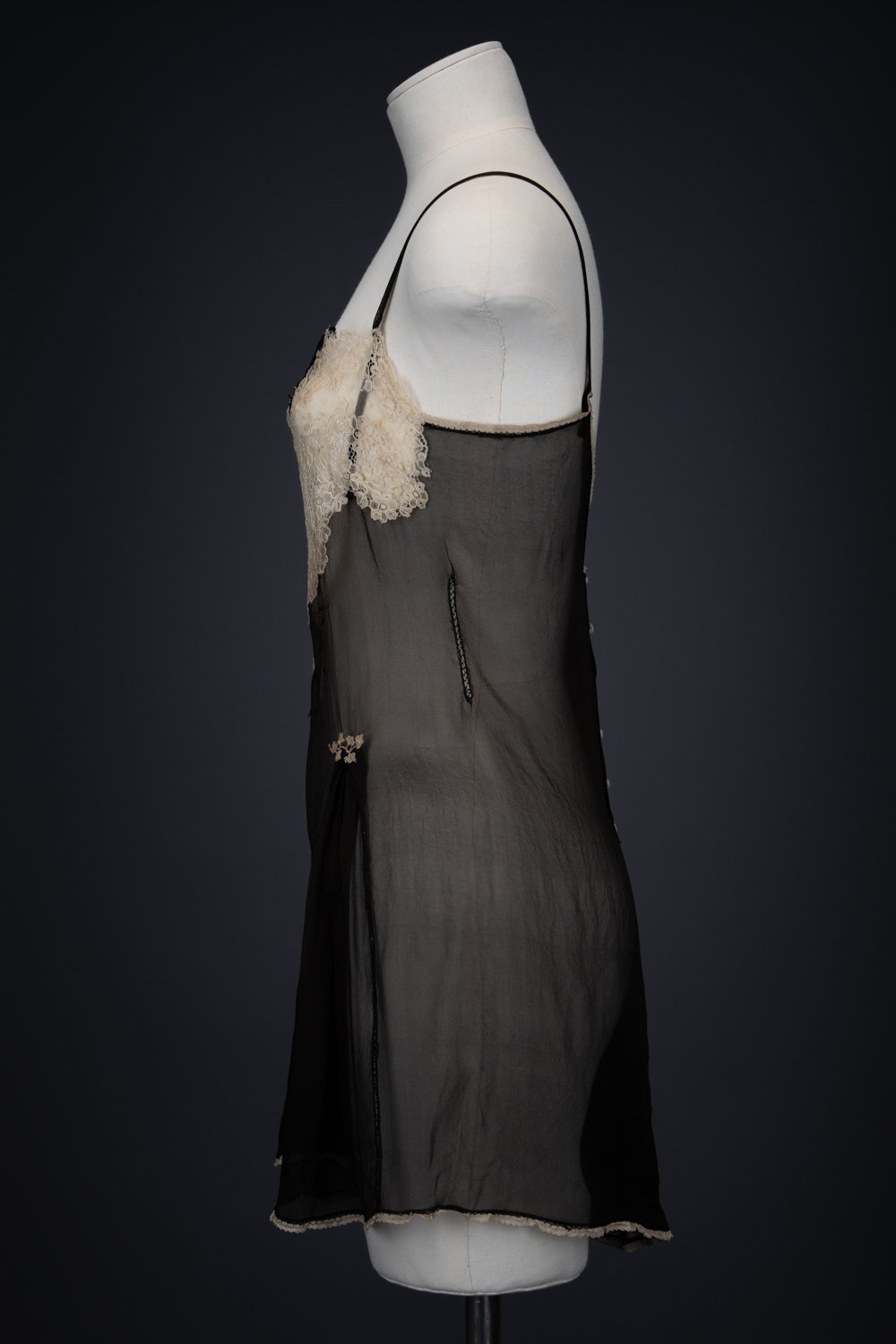 Black Silk Step In With Blonde Lace Appliqué By Chas A. Stevens & Bros, c. 1920s, USA. The Underpinnings Museum. Photography by Tigz Rice. Black Silk Step In With Blonde Lace Appliqué By Chas A. Stevens & Bros, c. 1920s, USA. The Underpinnings Museum. Photography by Tigz Rice.
