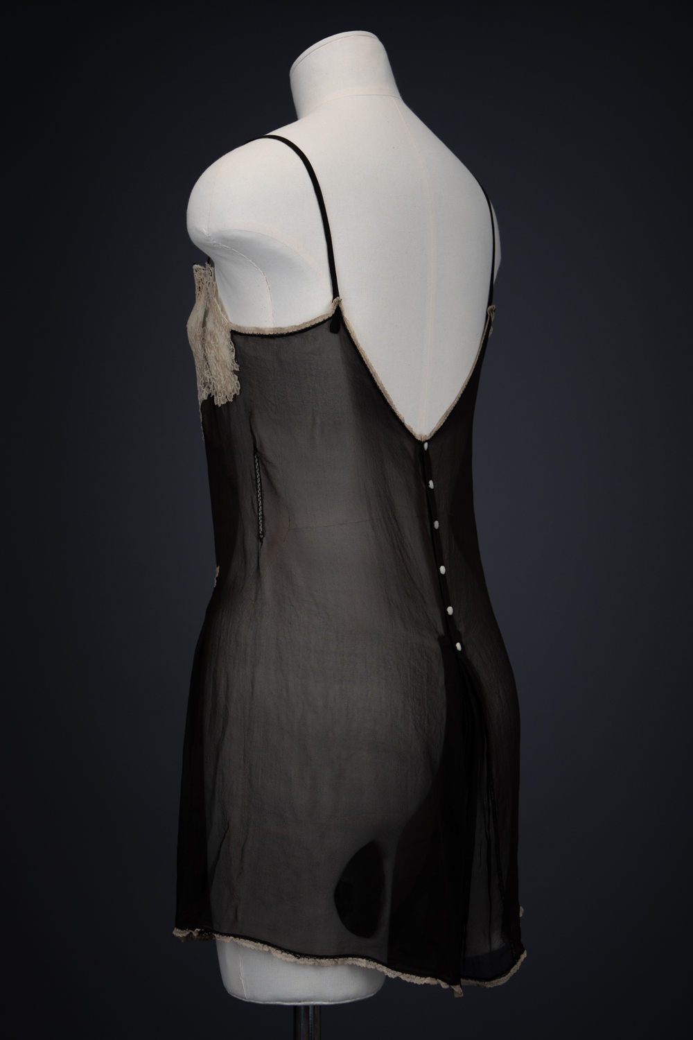 Black Silk Step In With Blonde Lace Appliqué By Chas A. Stevens & Bros, c. 1920s, USA. The Underpinnings Museum. Photography by Tigz Rice. Black Silk Step In With Blonde Lace Appliqué By Chas A. Stevens & Bros, c. 1920s, USA. The Underpinnings Museum. Photography by Tigz Rice.