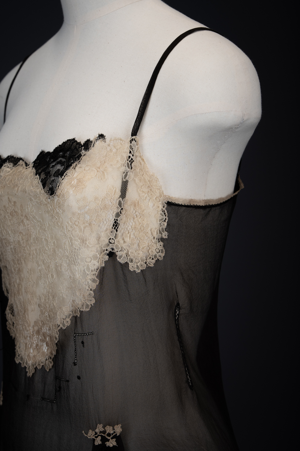 Black Silk Step In With Blonde Lace Appliqué By Chas A. Stevens & Bros, c. 1920s, USA. The Underpinnings Museum. Photography by Tigz Rice. Black Silk Step In With Blonde Lace Appliqué By Chas A. Stevens & Bros, c. 1920s, USA. The Underpinnings Museum. Photography by Tigz Rice.