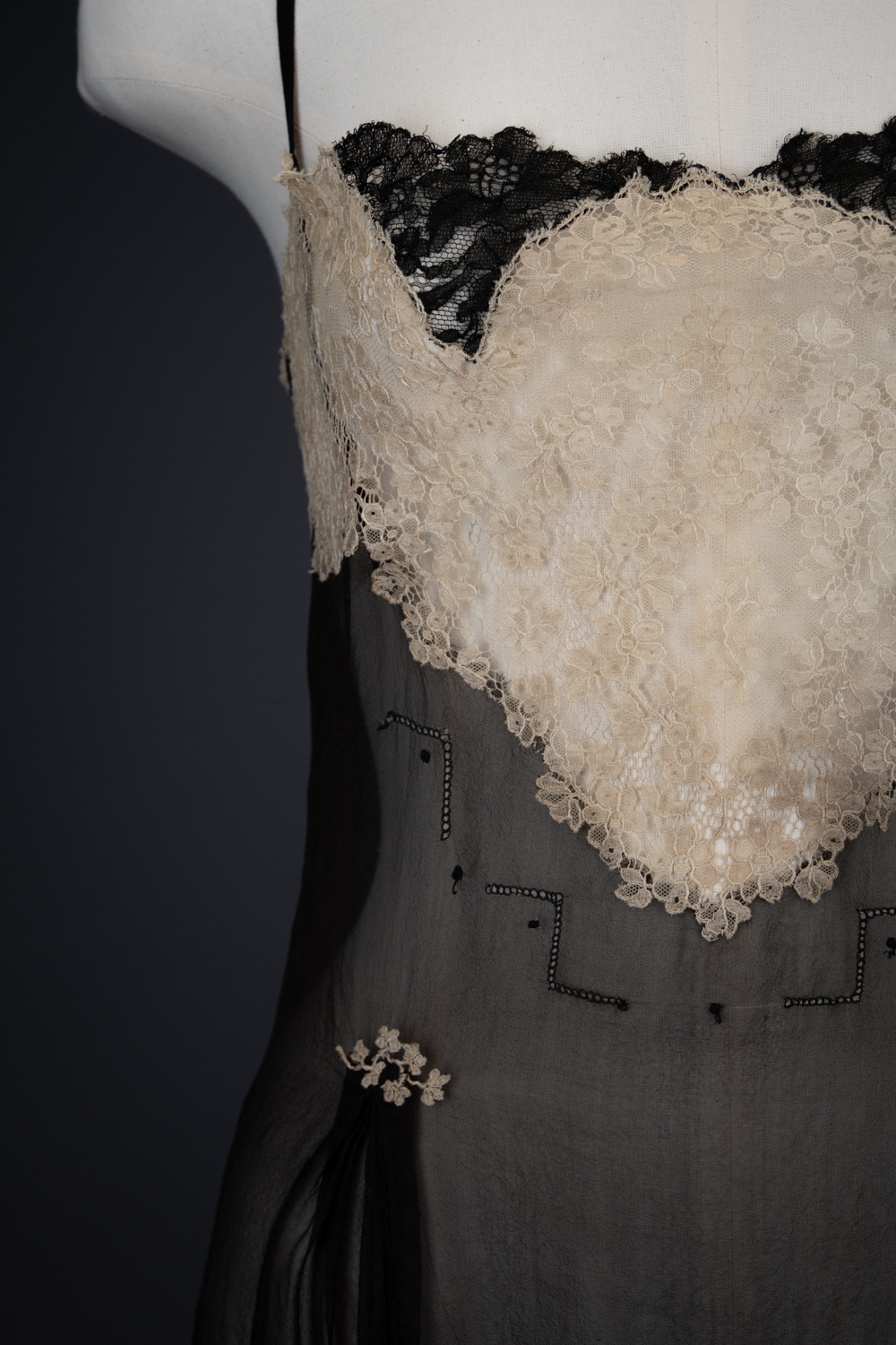 Black Silk Step In With Blonde Lace Appliqué By Chas A. Stevens & Bros, c. 1920s, USA. The Underpinnings Museum. Photography by Tigz Rice. Black Silk Step In With Blonde Lace Appliqué By Chas A. Stevens & Bros, c. 1920s, USA. The Underpinnings Museum. Photography by Tigz Rice.