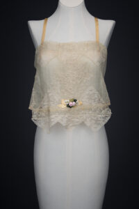 Embroidered Cotton Organdie Corset Cover With Machine Lace Trim & Silk Ribbonwork By Boué Soeurs, c. 1920s, France. The Underpinnings Museum. Photography by Tigz Rice.