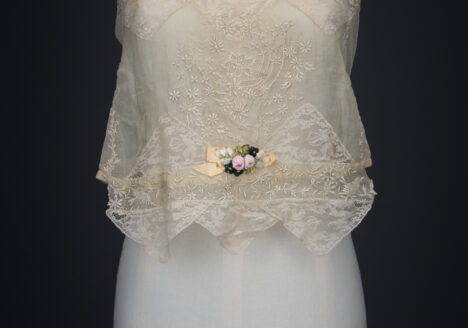 Embroidered Cotton Organdie Corset Cover With Machine Lace Trim & Silk Ribbonwork By Boué Soeurs, c. 1920s, France. The Underpinnings Museum. Photography by Tigz Rice.