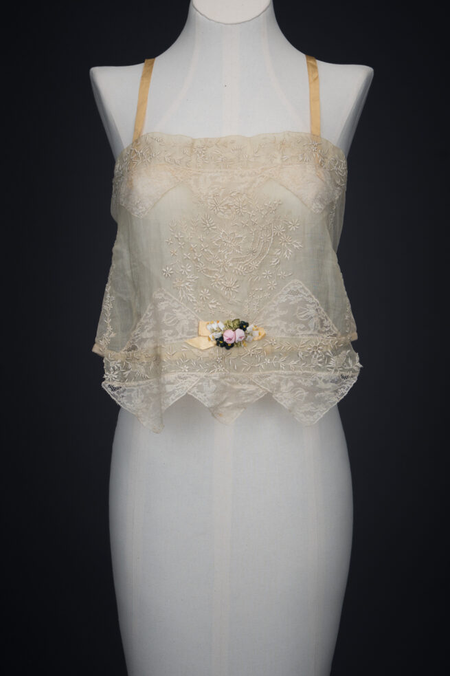 Embroidered Cotton Organdie Corset Cover With Machine Lace Trim & Silk Ribbonwork By Boué Soeurs, c. 1920s, France. The Underpinnings Museum. Photography by Tigz Rice.