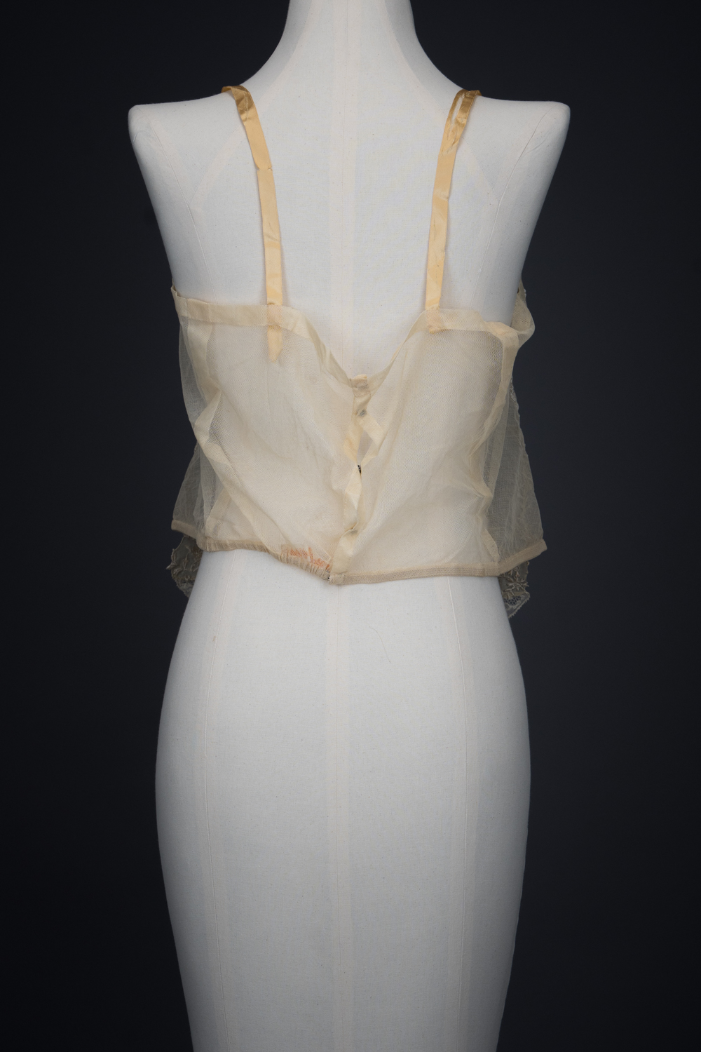 Embroidered Cotton Organdie Corset Cover With Machine Lace Trim & Silk Ribbonwork By Boué Soeurs, c. 1920s, France. The Underpinnings Museum. Photography by Tigz Rice.