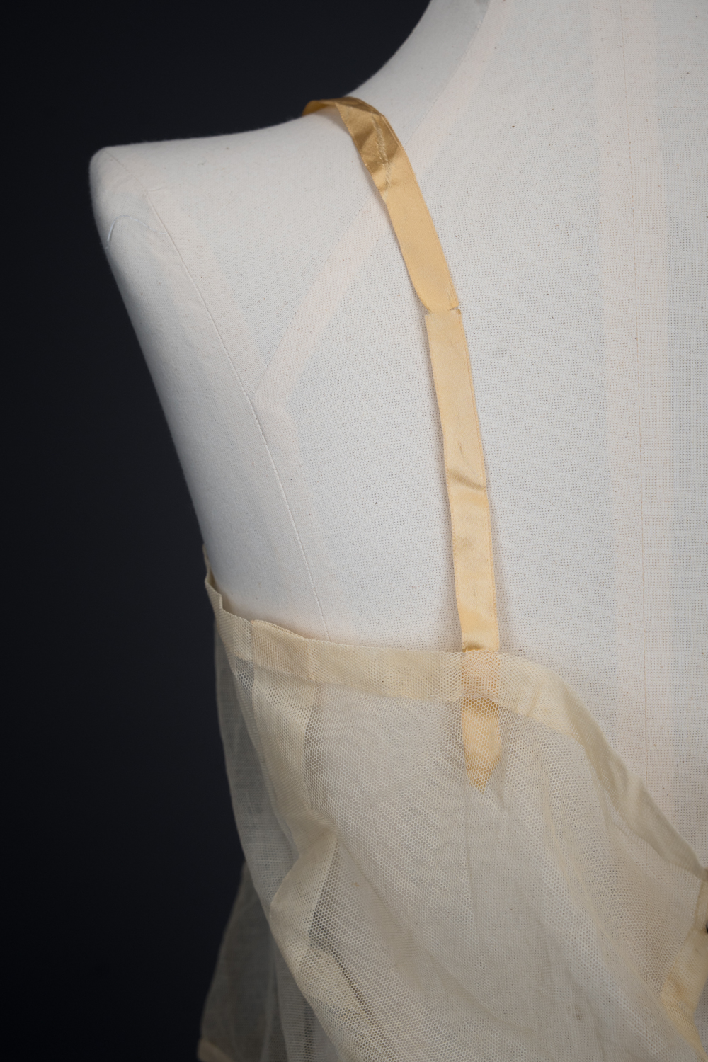 Embroidered Cotton Organdie Corset Cover With Machine Lace Trim & Silk Ribbonwork By Boué Soeurs, c. 1920s, France. The Underpinnings Museum. Photography by Tigz Rice.