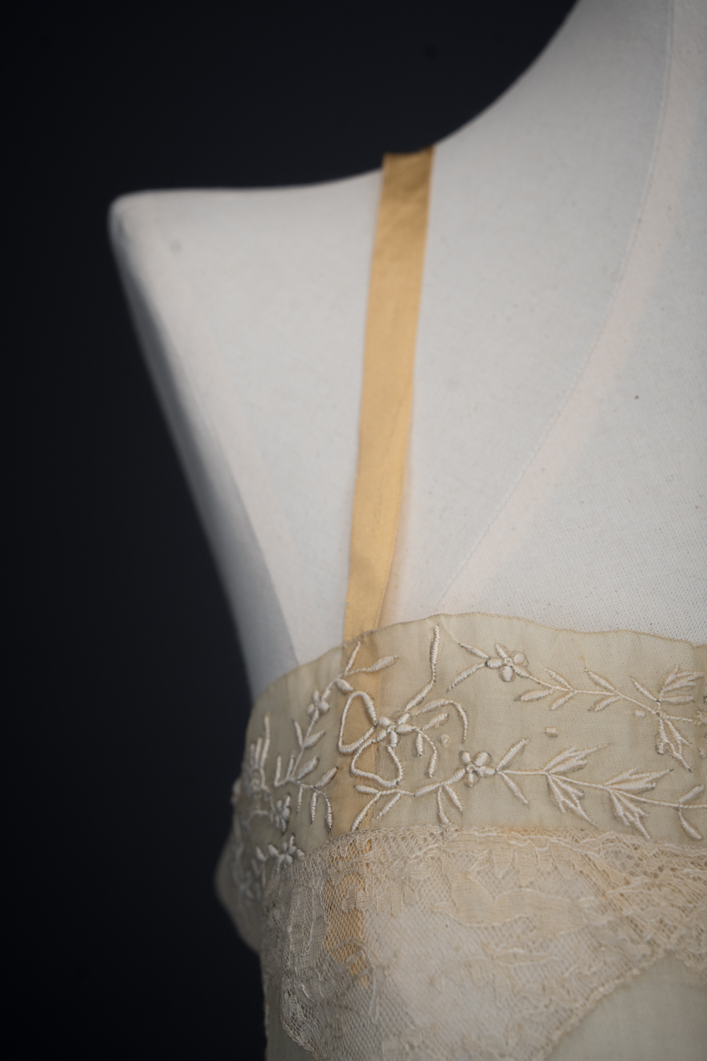 Embroidered Cotton Organdie Corset Cover With Machine Lace Trim & Silk Ribbonwork By Boué Soeurs, c. 1920s, France. The Underpinnings Museum. Photography by Tigz Rice.