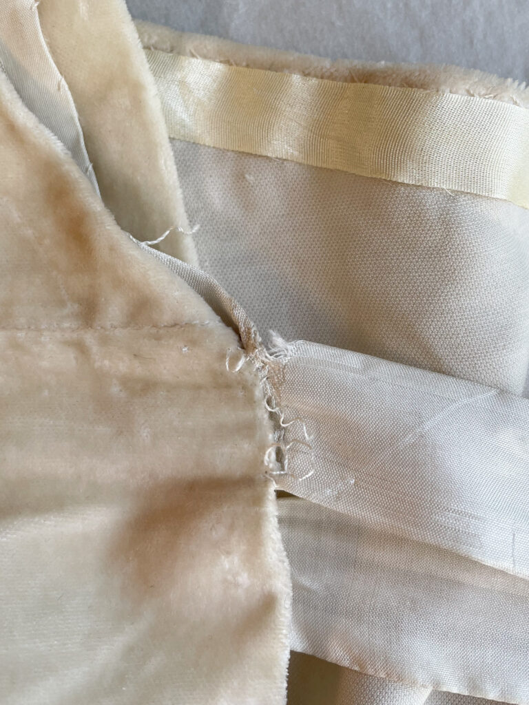 Before: Shoulder seam on a 1920s House Of Worth Gown. Photo by Annika Cilke